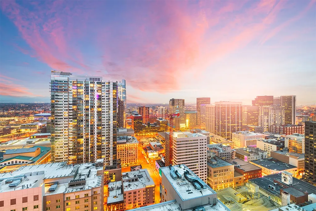 Experience the breathtaking cityscape of Denver at sunset.