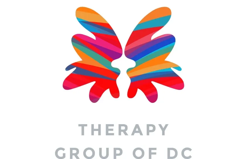 Colorful butterfly-shaped logo for Therapy Group of DC with bold rainbow-like stripes
